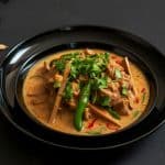 Creamy lamb curry with herbs