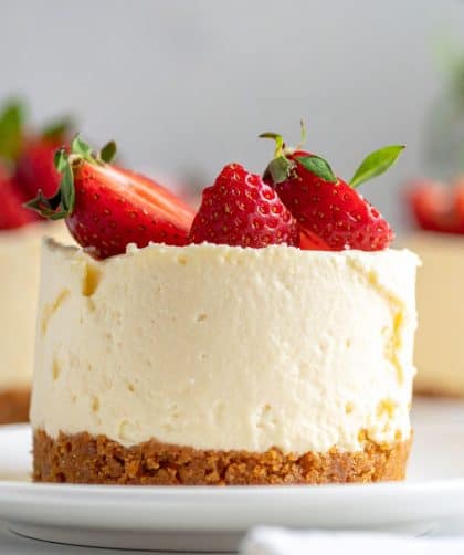 Lemon cheesecake topped with strawberries.