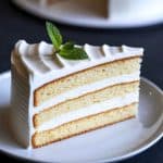 Slice of vanilla cake with frosting