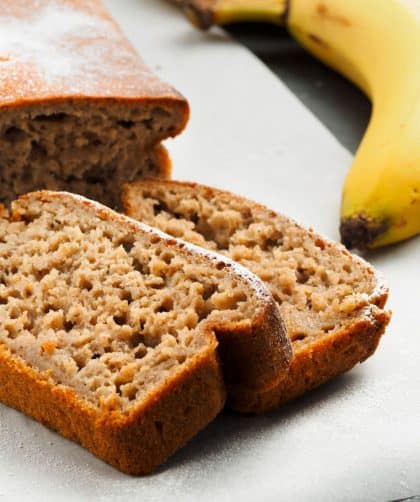 Sliced banana bread with bananas