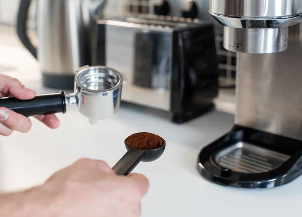 Preparing coffee with ground coffee