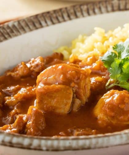 Chicken curry with yellow rice.