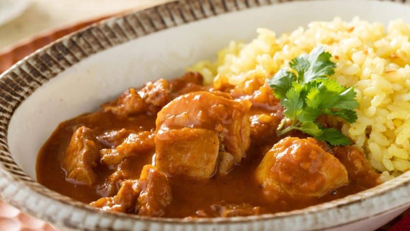 Chicken curry with yellow rice.