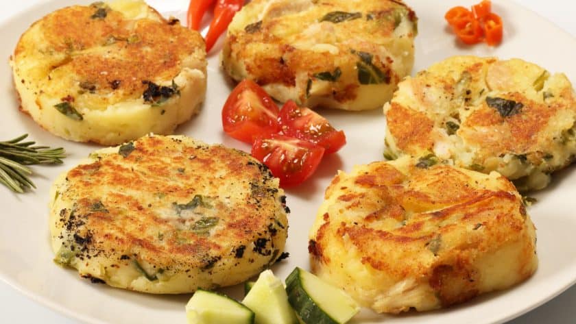Fried potato cakes with vegetables
