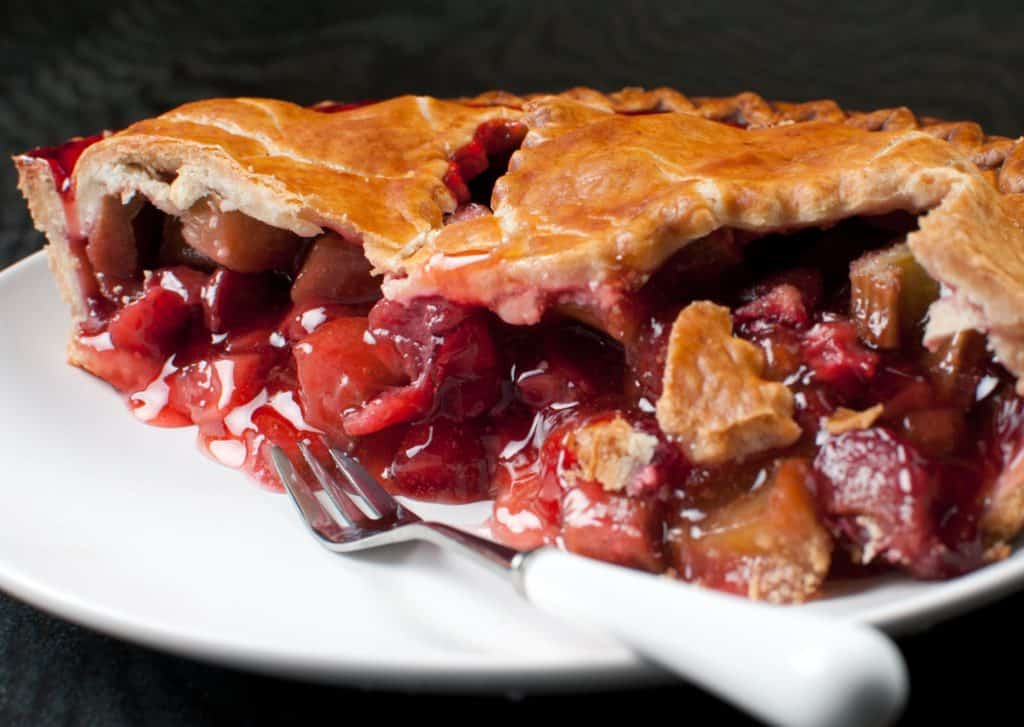 Slice of rhubarb pie on plate