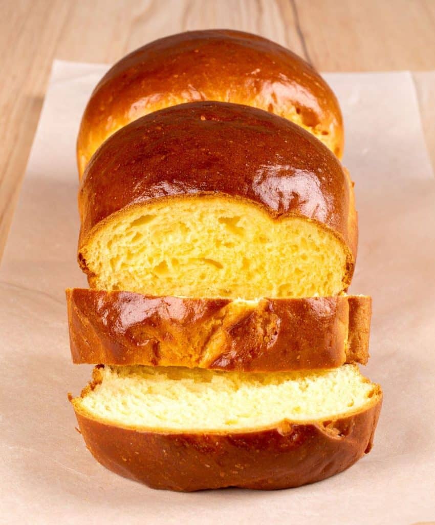 Sliced golden-brown brioche bread