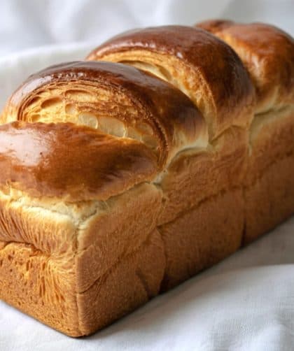 Golden, fluffy loaf of brioche bread