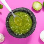 Green salsa in a stone bowl