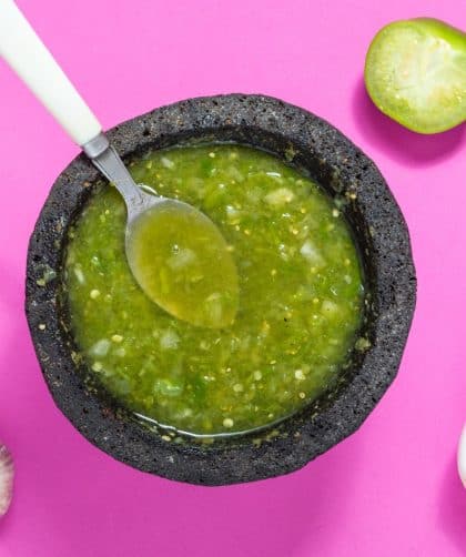 Green salsa in a stone bowl