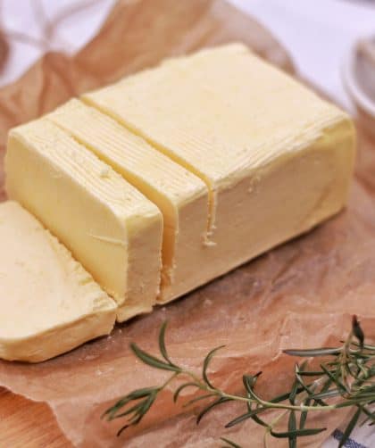 Block of butter on parchment paper
